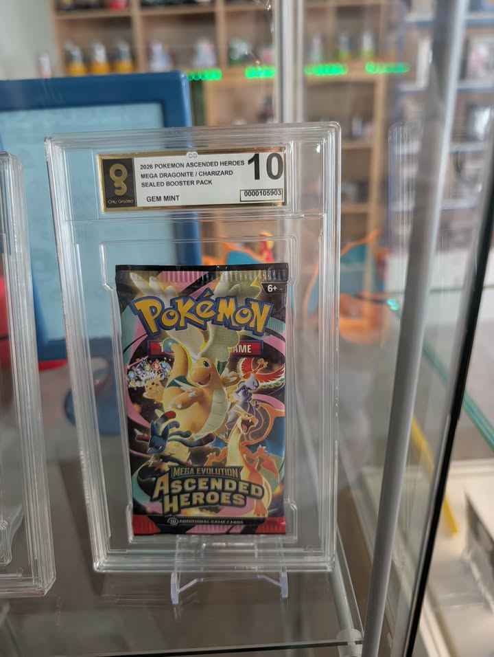 Pokémon trading card in a protective case with grading label
