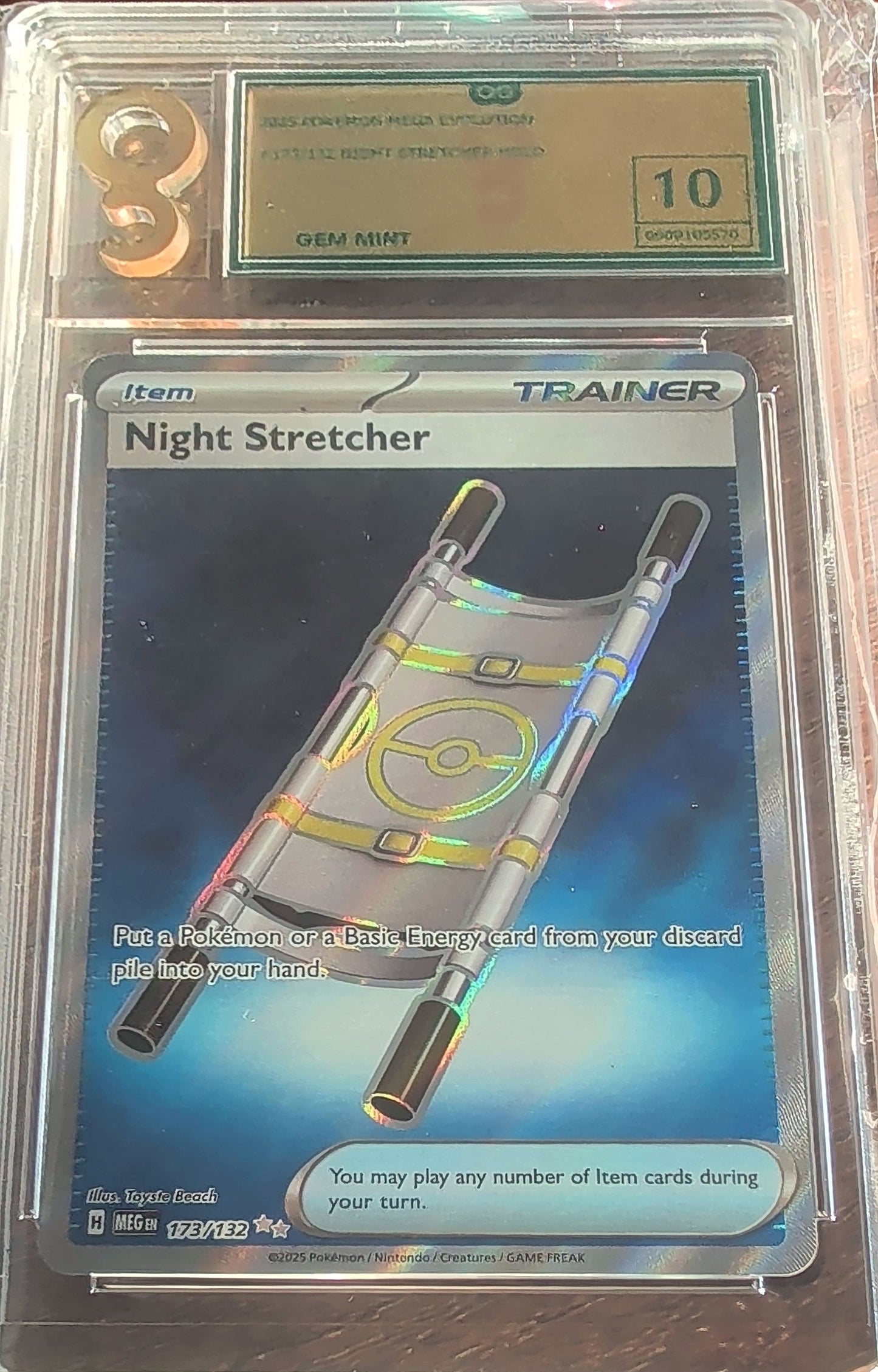 Trading card of 'Night Stretcher' in a protective sleeve with a grading label.