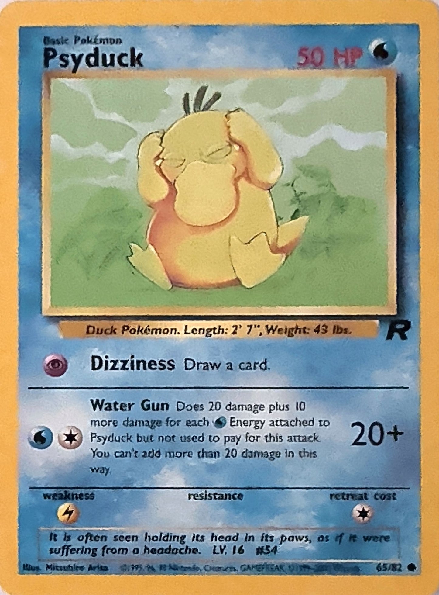 Psyduck Common Team Rocket 65/82 MP