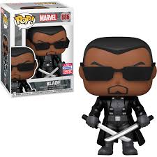 Blade Pop! vinyl figure with sunglasses and a sword, in front of its packaging.