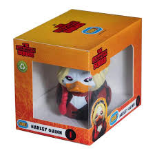 Harley Quinn action figure in a box with an orange and yellow packaging design.
