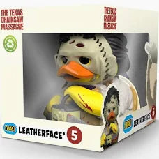 Leatherface action figure in packaging with 'The Texas Chainsaw Massacre' branding.