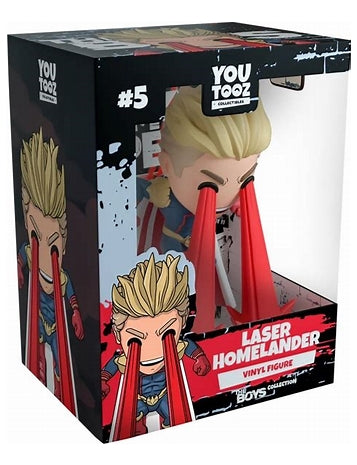 Boxed vinyl figure of a character with red cape and blonde hair, featuring 'YOU TOOZ' branding.