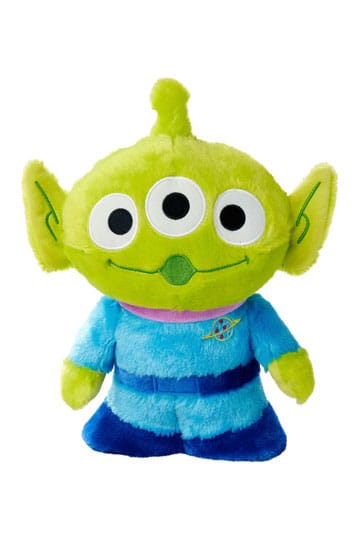 Plush toy resembling a green alien character with a blue shirt on a white background