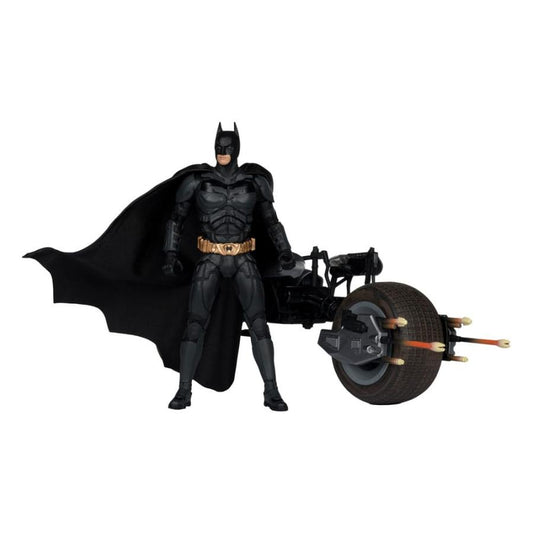 Batman action figure with a motorcycle on a white background